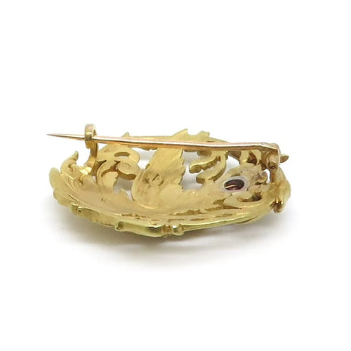 Broche Broche chimère Art nouveau en or jaune 18 carats et rubis 58 Facettes