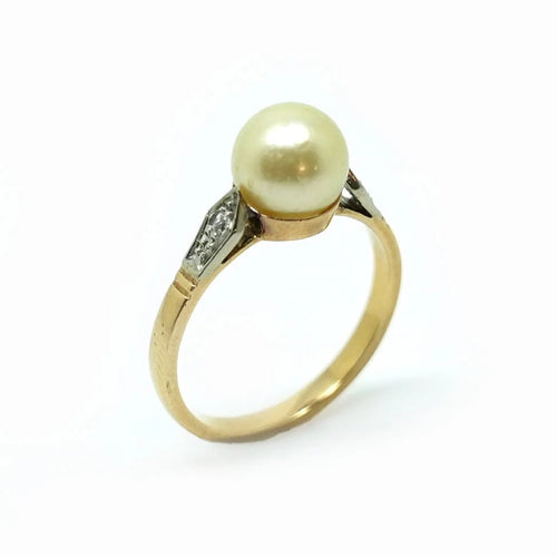 Bague 53 Bague en or jaune avec perle de culture et diamants 58 Facettes