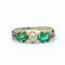 Bague 48 Bague en or jaune avec émeraudes et perle de culture 58 Facettes