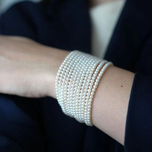 Bracelet De Saedeleer - Bracelet manchette en or jaune 18 carats et perles 58 Facettes