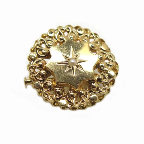 Broche Broche ronde en or jaune 18 carats et perle 58 Facettes
