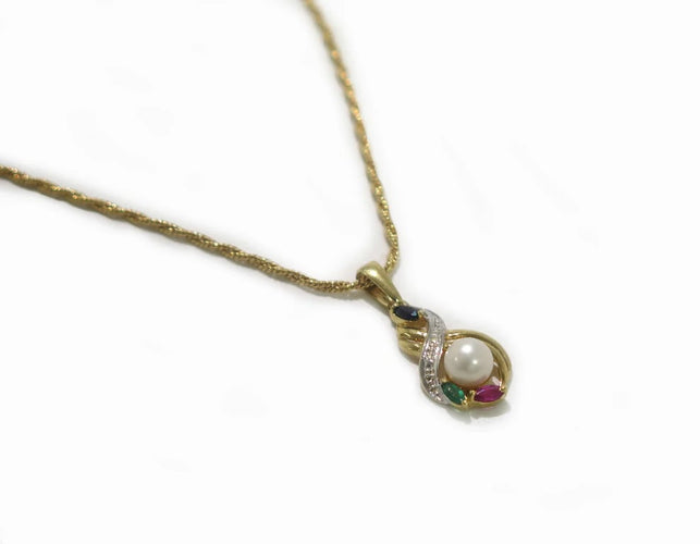 Pendentif Pendentif vintage en or jaune 18 carats, perles, émeraude, saphir et rubis 58 Facettes