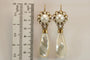 Boucles d'oreilles Boucles d'oreilles anciennes en or 14 carats et perles naturelles 58 Facettes 7594