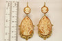 Boucles d'oreilles Boucles d’oreilles anciennes camées corniola en or jaune 14 carats 58 Facettes 7654