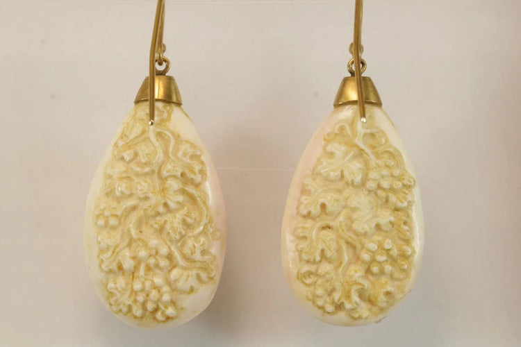 Boucles d'oreilles Boucles d'oreilles en or 14 carats avec camées en corail 58 Facettes 7664