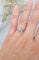 Bague 50 Bague fleur vintage en or gris 18 carats 58 Facettes 282