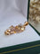 Pendentif Pendentif violon en or jaune 18 carats et spinelle synthétique 58 Facettes 385