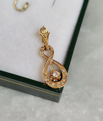 Pendentif Pendentif vintage entrelacé en or rose 18 carats et diamants 58 Facettes 643