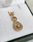 Pendentif Pendentif vintage entrelacé en or rose 18 carats et diamants 58 Facettes 643