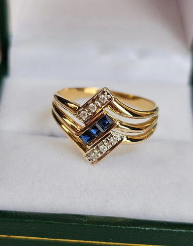 Bague 58 Bague vintage en or jaune 18 carats avec saphirs et diamants 58 Facettes 592
