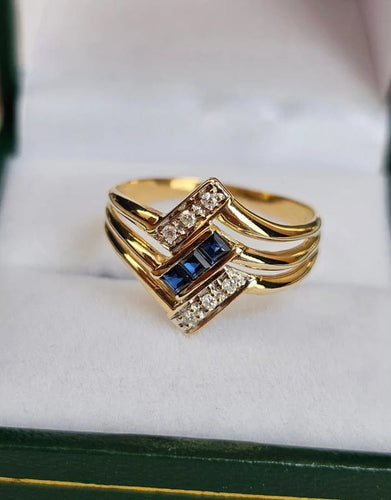 Bague 58 Bague vintage en or jaune 18 carats avec saphirs et diamants 58 Facettes 592