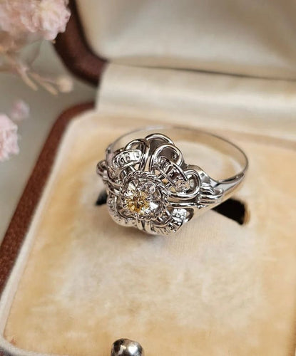 Bague 54 Bague vintage en or blanc 18 carats sertie d’un diamant jaune 58 Facettes 555
