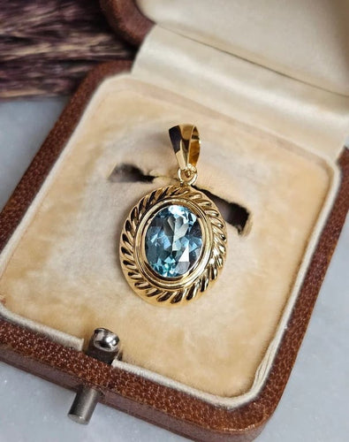 Pendentif Pendentif vintage en or jaune 18 carats et topaze 58 Facettes 530