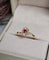 Bague 50.5 Bague en or jaune 18 carats avec rubis et diamants 58 Facettes 712