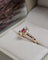 Bague 50.5 Bague en or jaune 18 carats avec rubis et diamants 58 Facettes 712