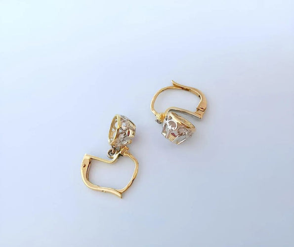 Boucles d'oreilles Boucles d’oreilles dormeuses anciennes vers 1900 en or 18K, platine, diamants et rubis 58 Facettes 1767