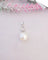 Pendentif Pendentif perle de culture et diamants en or blanc 18 K 58 Facettes AB 1081