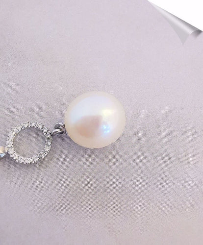 Pendentif Pendentif perle de culture et diamants en or blanc 18 K 58 Facettes AB 1081