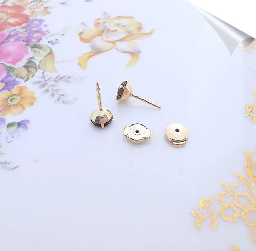 Boucles d'oreilles Boucles d'oreilles puces clous en or jaune 18K et quartz fumé 58 Facettes AA 1525