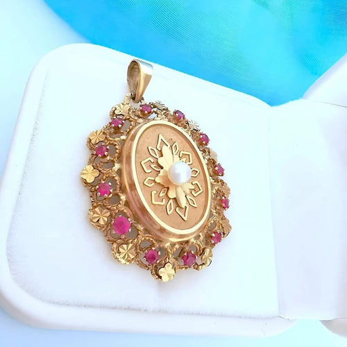 Pendentif Pendentif médaillon vintage en or rose 18K avec perle et rubis synthétiques 58 Facettes 1753