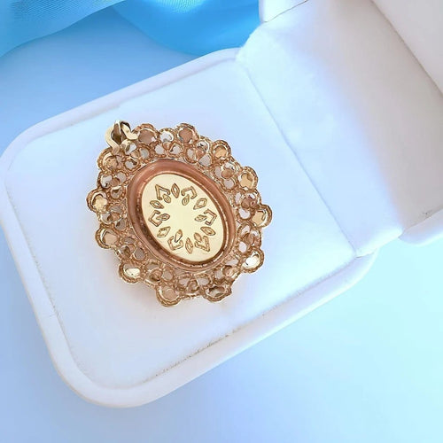Pendentif Pendentif médaillon vintage en or rose 18K avec perle et rubis synthétiques 58 Facettes 1753