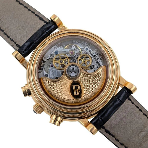 Montre Parmigiani Fleurier Toric - Montre chronographe date en or rose 18 carats 58 Facettes