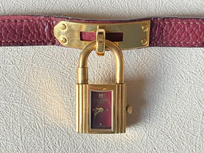 Montre Hermès Kelly - Montre à quartz en plaqué or et cuir bordeaux 58 Facettes WC-2025-1886