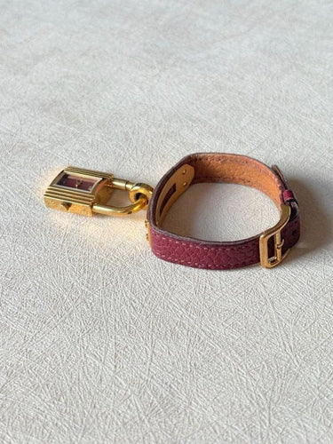 Montre Hermès Kelly - Montre à quartz en plaqué or et cuir bordeaux 58 Facettes WC-2025-1886