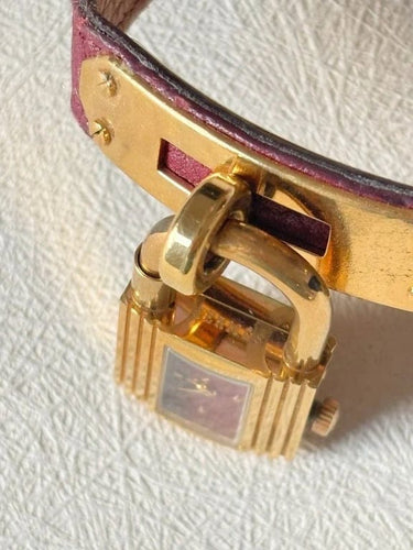 Montre Hermès Kelly - Montre à quartz en plaqué or et cuir bordeaux 58 Facettes WC-2025-1886