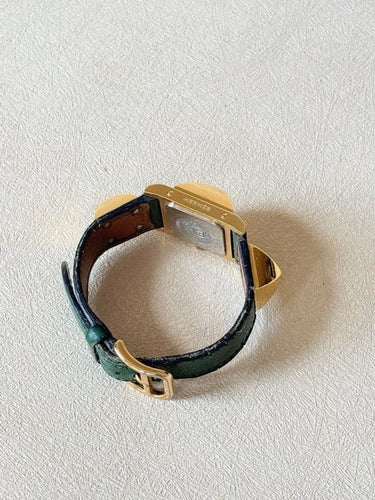 Montre Hermès Médor - Montre en plaqué or, cuir vert 58 Facettes WC-2025-1884