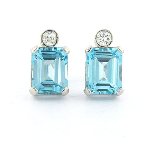 Boucles d'oreilles Boucles d’oreilles puces en or blanc 14 carats avec topazes et diamants 58 Facettes