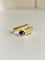 Bague 53 Bague serpent godronnée en or jaune 18k et saphir cabochon 58 Facettes