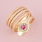 Bague 64-65 Bague serpent ancienne en or rose 18k, rubis et diamants 58 Facettes