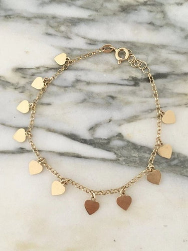 Bracelet Bracelet cœurs en or jaune 18k 58 Facettes