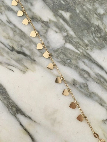 Bracelet Bracelet cœurs en or jaune 18k 58 Facettes