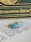 Bague 58 Bague fleur ancienne en or jaune 18K, perles et turquoises 58 Facettes