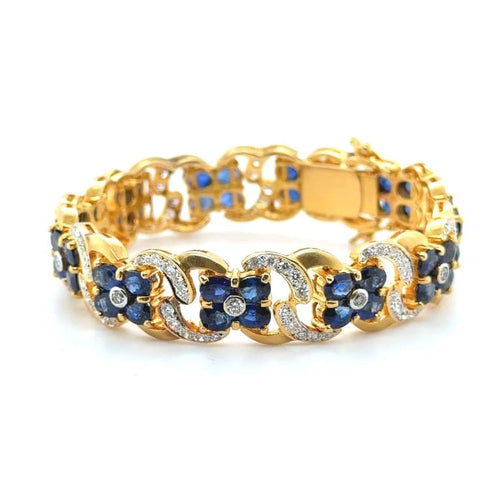 Bracelet Bracelet en or jaune 22 carats serti de saphirs et diamants 58 Facettes 1.0002546/1