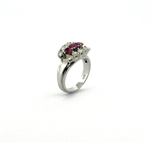 Bague 58 Bague jarretière ancienne en or blanc 14 carats, diamants et rubis 58 Facettes 0