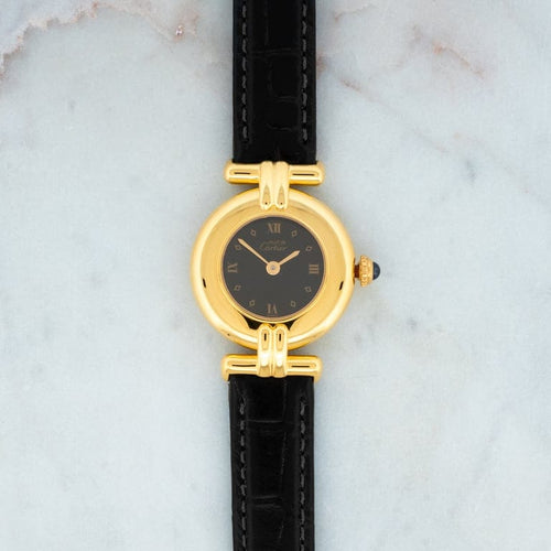 Montre Cartier Must Colisée - Montre femme en vermeil, cadran romain noir 58 Facettes 1