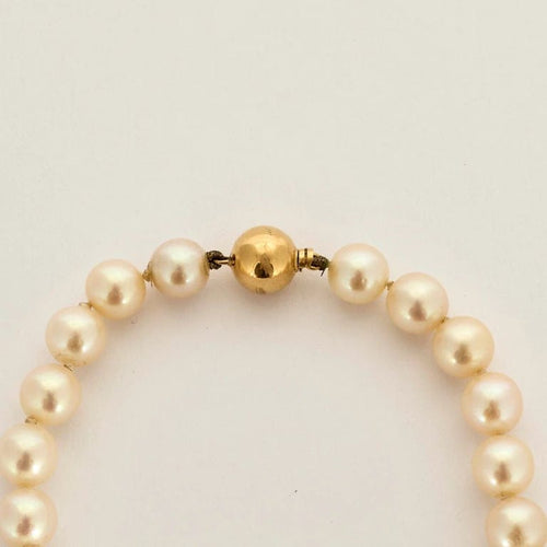 Collier Collier de perles Akoya en or jaune 22 carats 58 Facettes