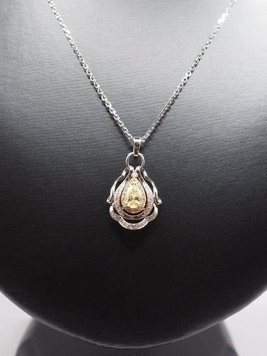 Collier Collier en or bicolore 18 carats et diamant jaune 0,5 ct 58 Facettes 226