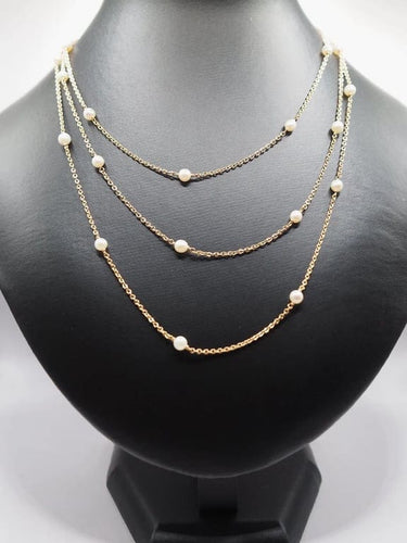 Collier Sautoir en or jaune 18 carats et perles fines (120 cm) 58 Facettes 1111