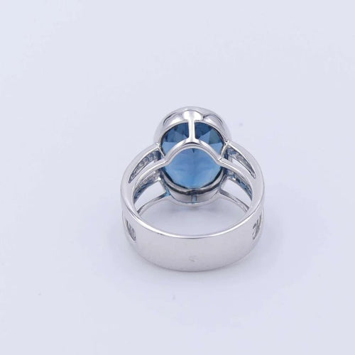 Bague 53 Bague solitaire en or blanc 18 ct avec topaze London blue et diamants 58 Facettes 323579