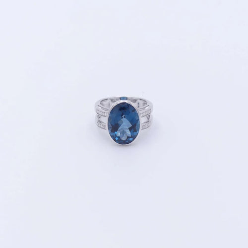 Bague 53 Bague solitaire en or blanc 18 ct avec topaze London blue et diamants 58 Facettes 323579