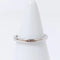Bague 50 Cartier Ballerine - Bague incurvée en platine et diamants 58 Facettes 1