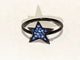 Bague 54 Djula - Bague étoile en or noir 18k et saphirs bleus 58 Facettes