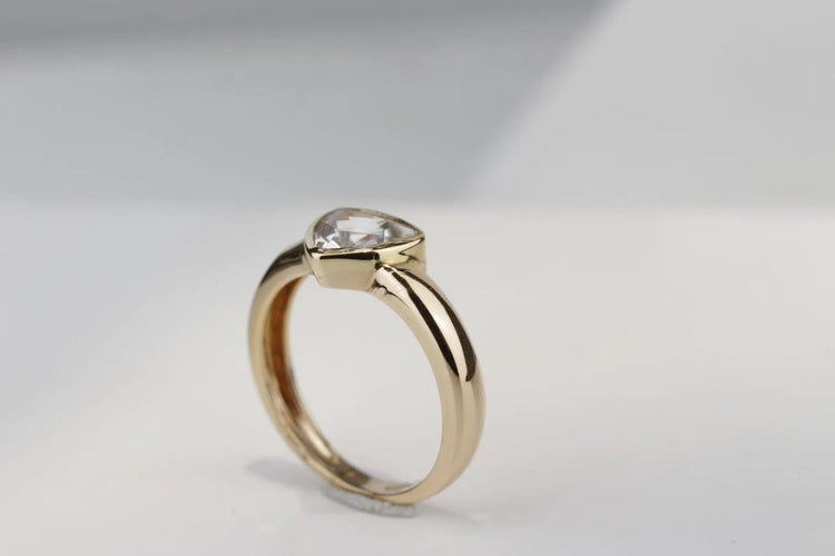 Bague 52 Bague trillion en or rose 18K et aigue-marine 58 Facettes