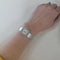 Montre Tissot - Montre en or gris 750 sertie de diamants 58 Facettes