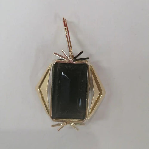 Pendentif Pendentif en or jaune 750 orné d’un quartz fumé 58 Facettes