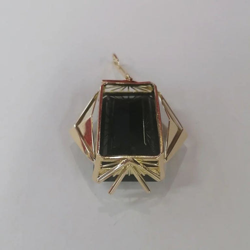 Pendentif Pendentif en or jaune 750 orné d’un quartz fumé 58 Facettes